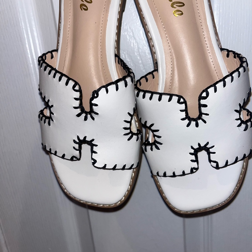 Stylish White Sandals with Black Stitching